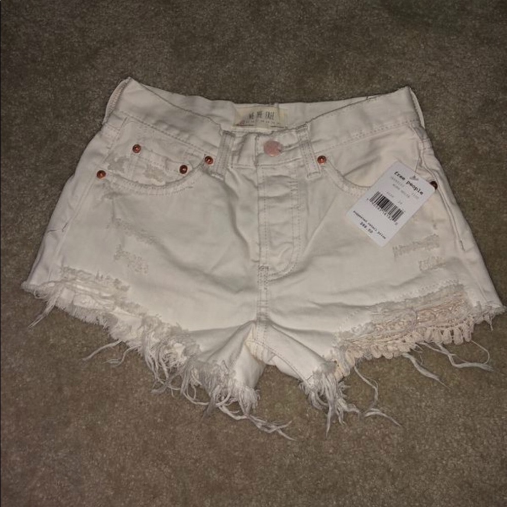 We the free distressed white shorts